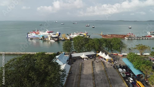 Bintan, Riau Island, Indonesia - Feb 22, 2023: Aerial of Tanjunguban port or harbour with KMP Bahtera Nusantara 03 photo