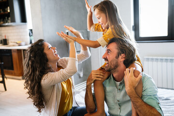 Happy family having fun time at home together. People love, happiness concept.