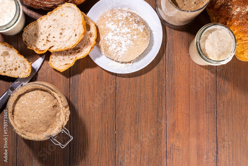 Fototapeta Naklejka Na Ścianę i Meble -  Active homemade sourdough in jars