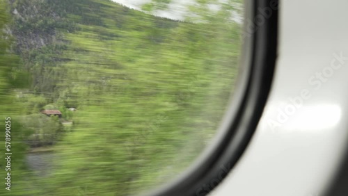 Train ride from Oslo to Bergen with the Bergensbanen looking out through the window
