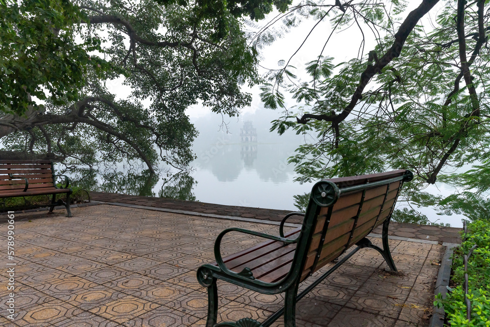 Hoan Kiem Lake ( Ho Guom) in the center of Hanoi in the fog in the morning. Hoan Kiem Lake is a famous tourist place in Hanoi