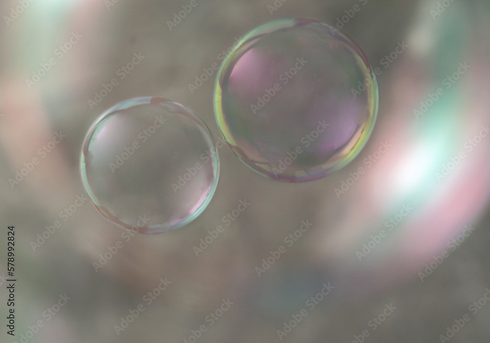 Realistic soap bubble. Detergent foam rainbow colored ball as a background. laundry concept.