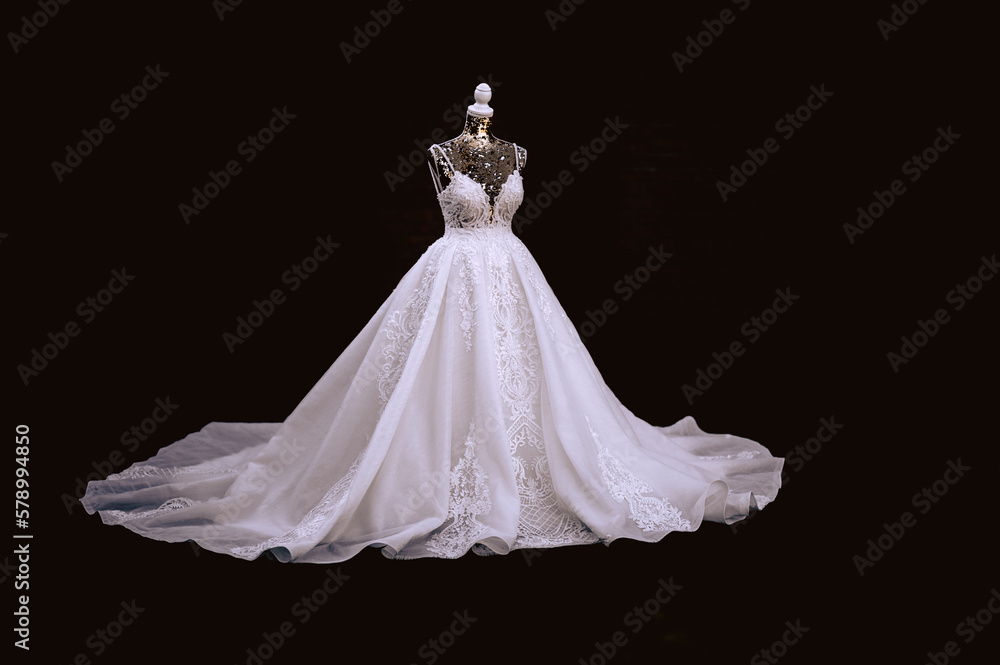 Wedding dress isolated on black background. 