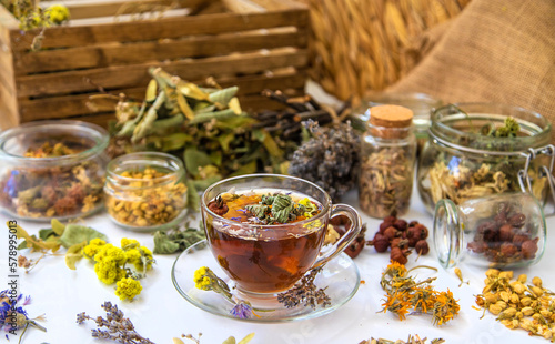 Herbal tea with medicinal herbs and flowers. Selective focus.