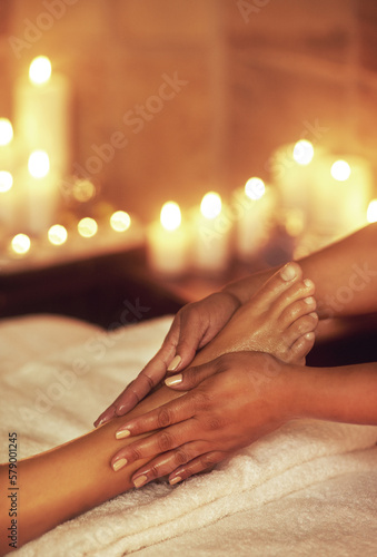 Be good to your feet. a woman enjoying a foot massage at a spa. © Donson/peopleimages.com