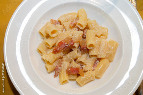 Eating pasta carbonare with guanciale in rome italy