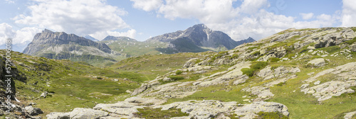 Magnificent panoramic mountain landscape during summer under a blue sky