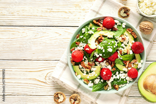 Concept of tasty salad, salad with strawberry, space for text