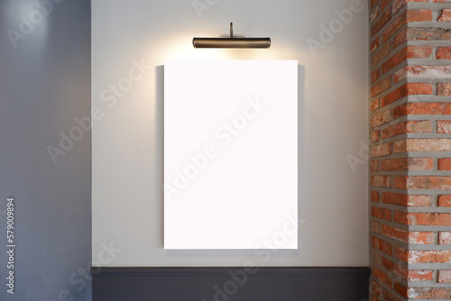 Mockup of black frame in room interior with lighting. Simple Mockup of white blank board. photo