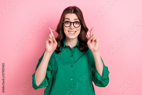 Leinwand Poster Photo of worried corporate person biting lips crossed fingers pray hope isolated
