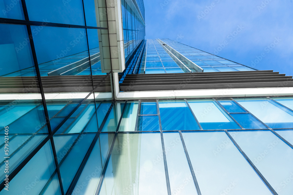 Obraz premium Glass office building exterior against the sky
