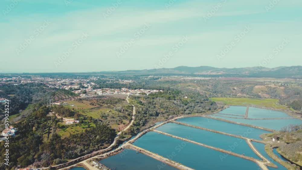 Abandoned fish farm pool of water has unnatural dirty water Abandoned fish farm pool of water has unnatural dirty water