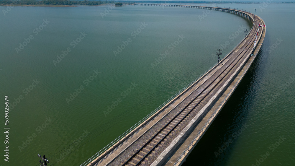 train tracks passing by the lake tourist attractions of thailand train tracks passing by the lake tourist attractions of thailand