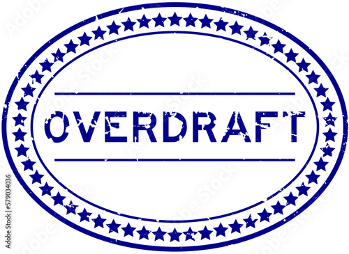 Grunge blue overdraft word oval rubber seal stamp on white background