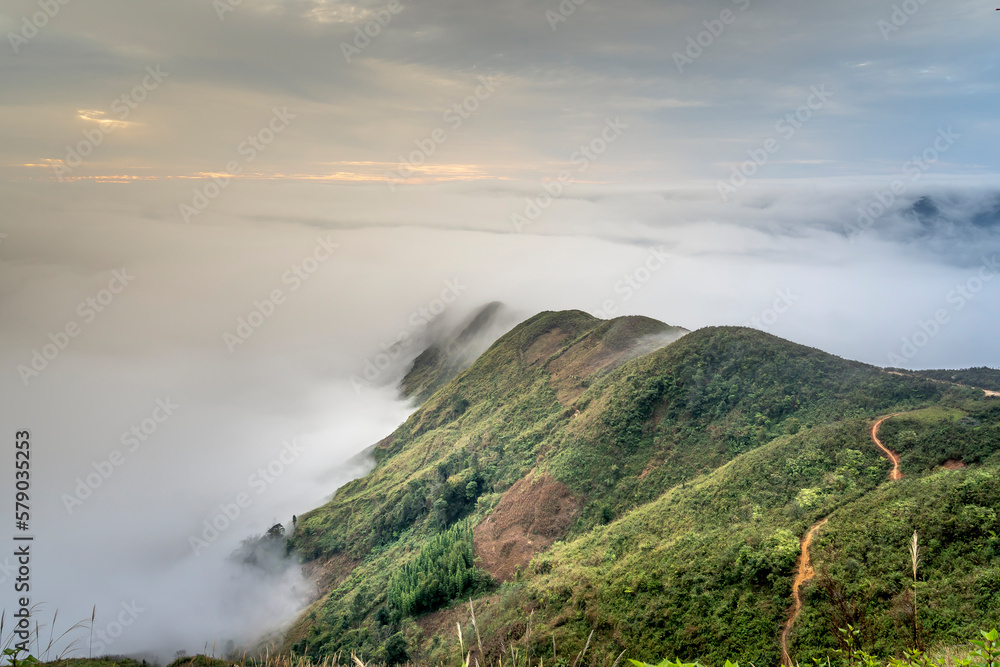 Beautiful landscape with fog and mountain in Ta Xua, Son La, Vietnam