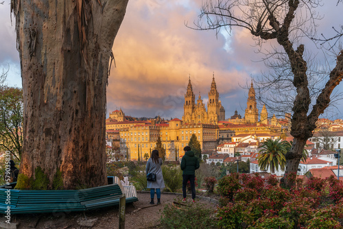 View of the cathedral of Santiago de Compostela from the Alameda park at sunset, in Galicia, Spain photo