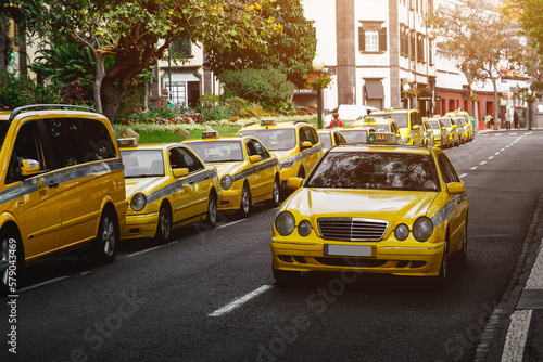 Taxi service on the roads of city.