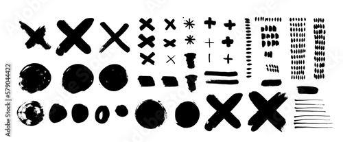 Collection of strokes made with brush and black paint, real handmade strokes with various shapes, circles, crosses, elongated. Vector strokes in black color
