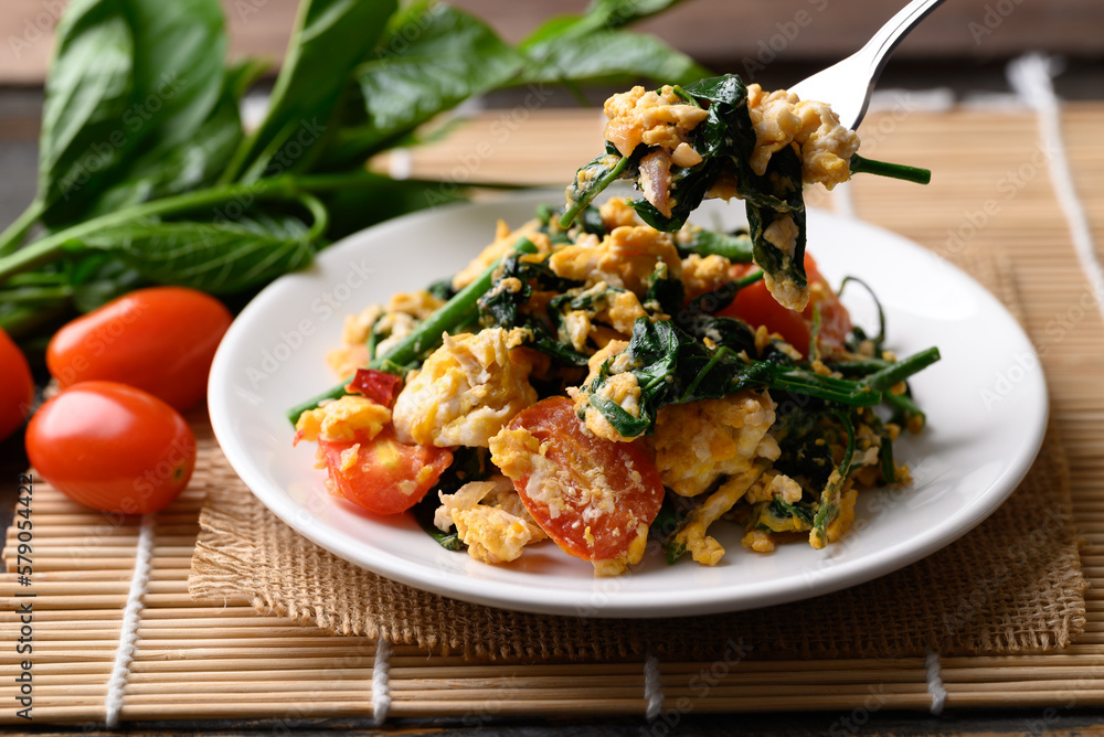 Northern Thai food, Stir fried gurmar leaf (Gymnema inodorum) with egg, Local food Northern Thai food, Stir fried gurmar leaf (Gymnema inodorum) with egg, Local food