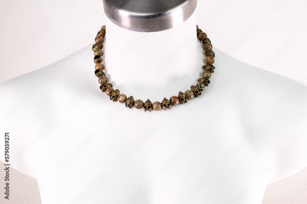 Statement stone beaded necklace on a white mannequin, massive unusual handmade jewelry Statement stone beaded necklace on a white mannequin, massive unusual handmade jewelry