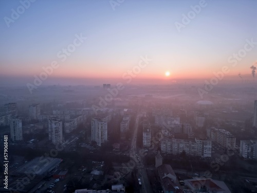 Foggy sunrise over Sofia(Bulgaria) city viewed from drone - eastern area with view to the East