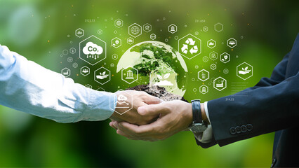 environment earth day In the hands of a businessman handing a planted tree ESG icon concept, environment, society and governance. Sustainable and ethical natural gas business energy connected