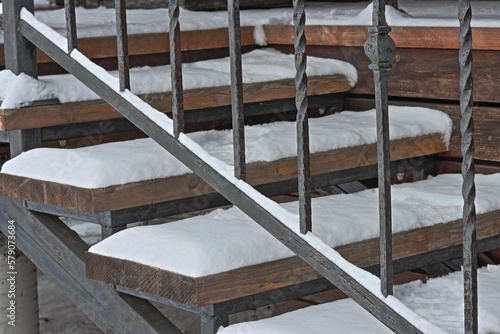 Rusty baluster stairs to the veranda