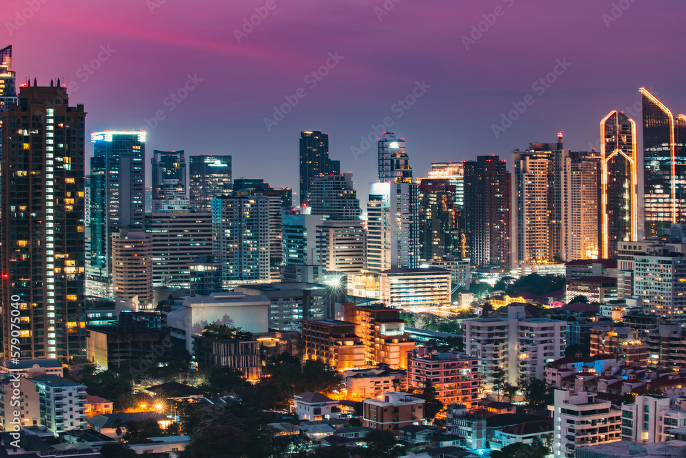 Night of the Metropolitan Bangkok City a Bangkok, Thailand is shown in the background.