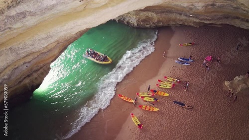 Flying, erial view of Benagil caves and the Atlantic ocean coast. Lagoa, Algarve, Portugal.