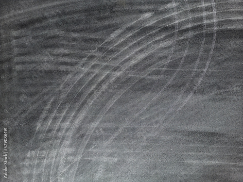 Top view of asphalt road with tire marks