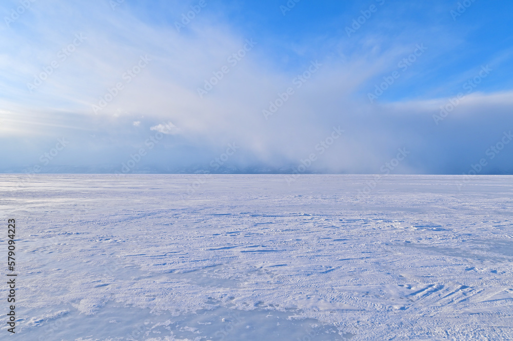 Beautiful Scenery of Frozen Lake Baikal Covered with Snow During Snowstorm Beautiful Scenery of Frozen Lake Baikal Covered with Snow During Snowstorm