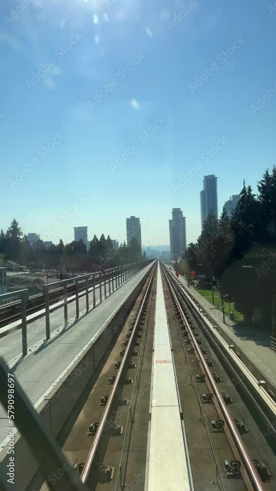 time-lapse vancouver skytrain The distance between two stops shooting in the windshield you can see the rails flickering as well as skyscrapers in the distance 09.2022 Canada time-lapse vancouver skytrain The distance between two stops shooting in the windshield you can see the rails flickering as well as skyscrapers in the distance 09.2022 Canada