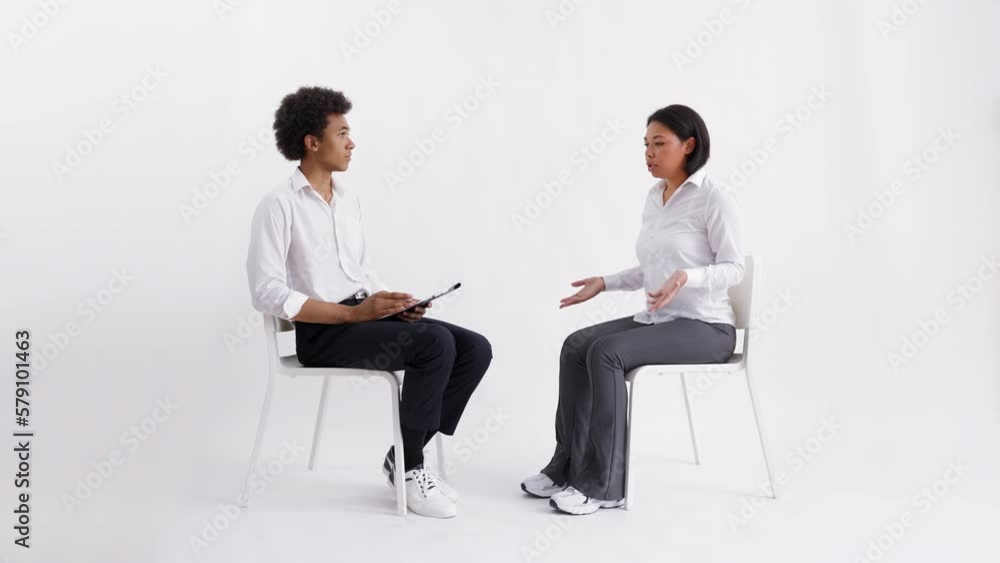 Sad woman having virtual reality meeting with psychiatrist, futuristic therapy Sad woman having virtual reality meeting with psychiatrist, futuristic therapy