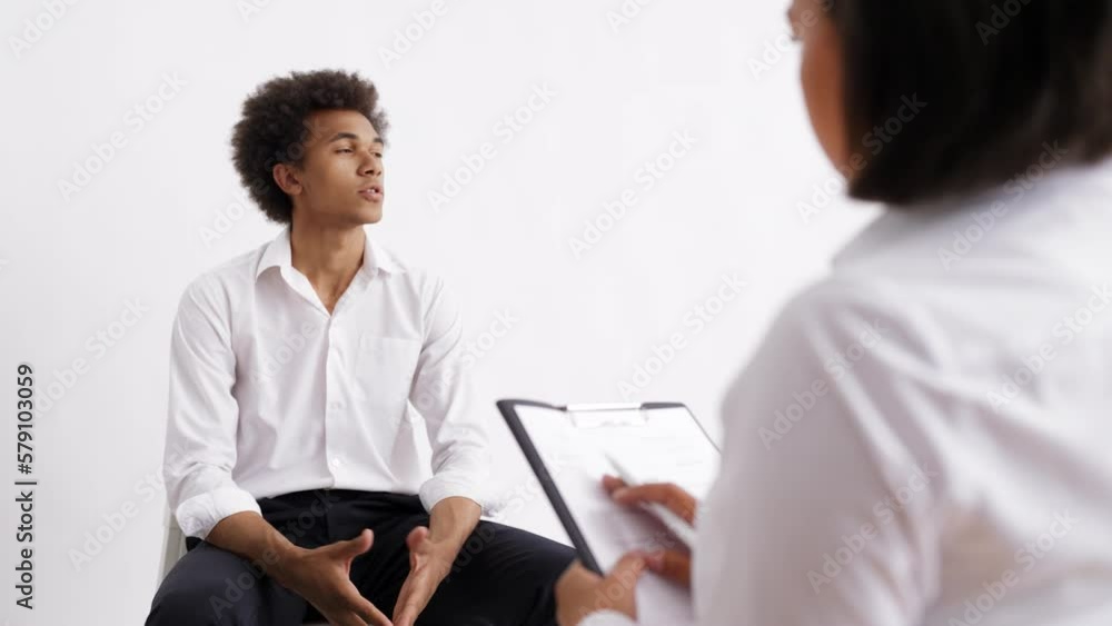 African American man talking with virtual doctor, meeting inside patient's mind African American man talking with virtual doctor, meeting inside patient's mind