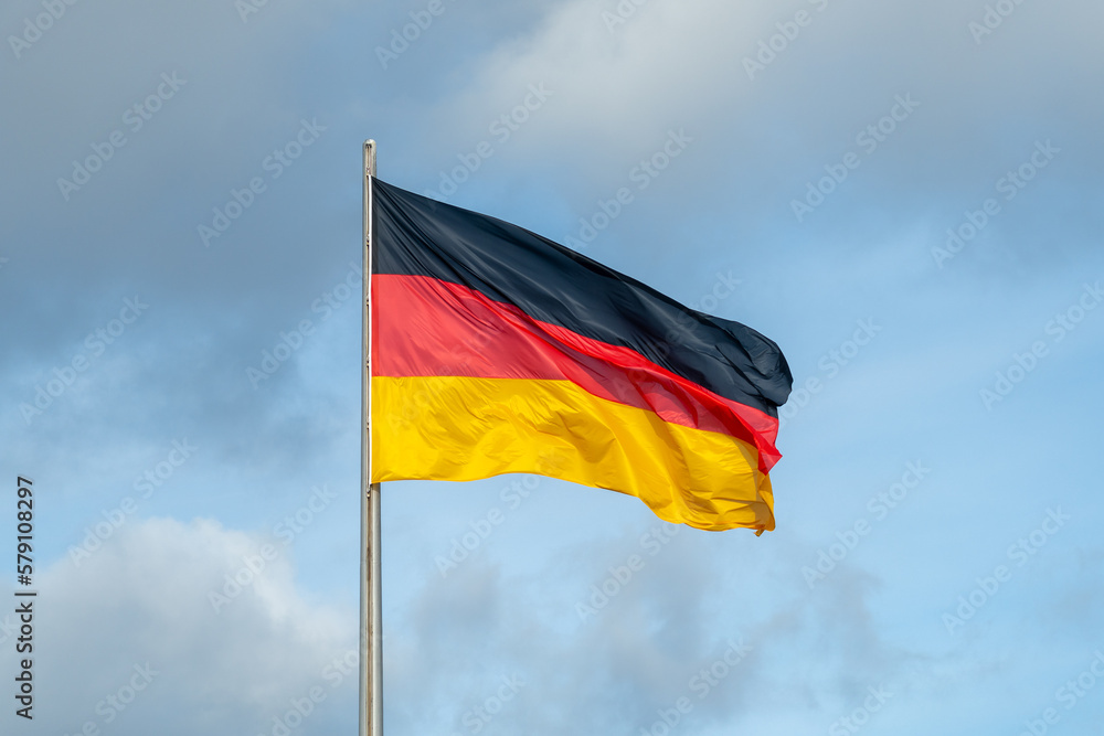 German Flag Berlin Germany Deutschland Flagge with Blue Sky German Flag Berlin Germany Deutschland Flagge with Blue Sky