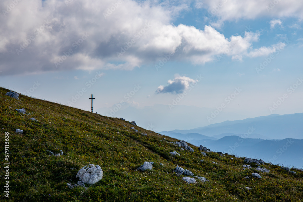 Fototapeta premium Cross up in the Alps mountains