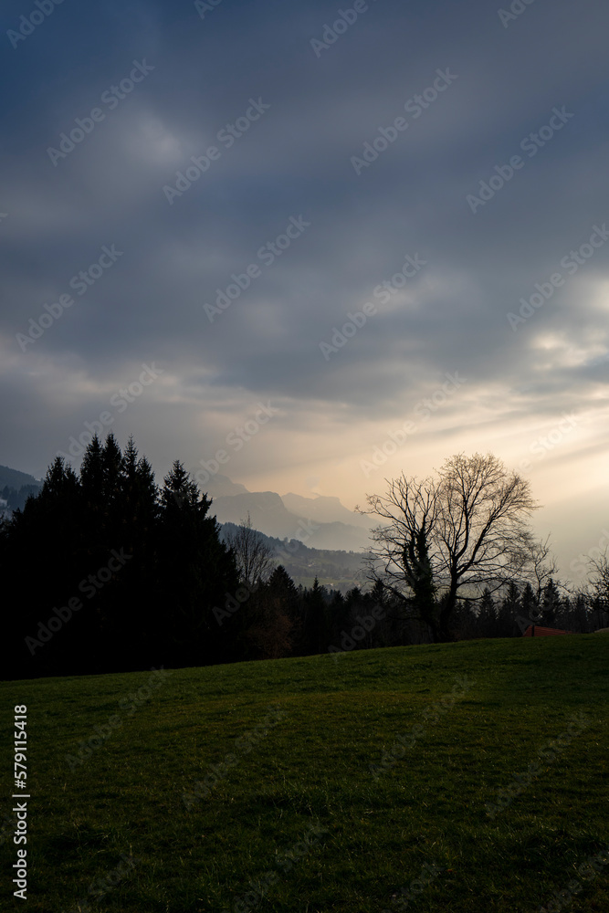 sunset with layers in the foggy mountains sunset with layers in the foggy mountains