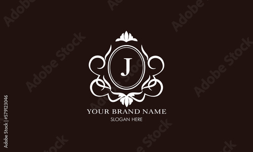 Vector illustration of letter J logo template. Classic floral monogram with decorative elements.