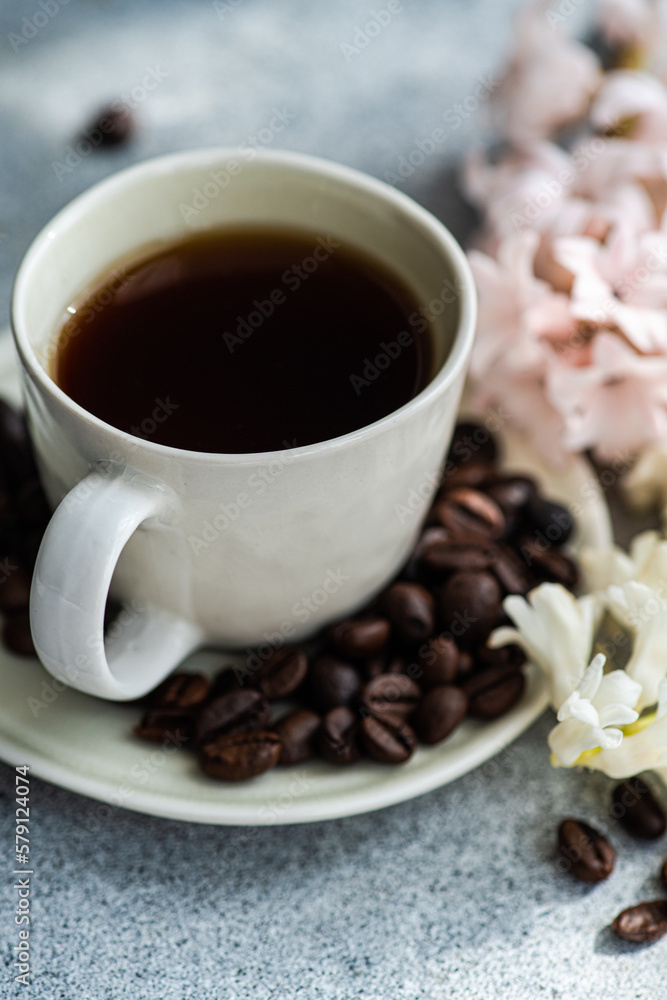 Black coffee with spices and flowers