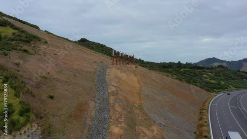 Aerial, drone shot of Maori carvings, and sculptures on a hill. New Zealand photo