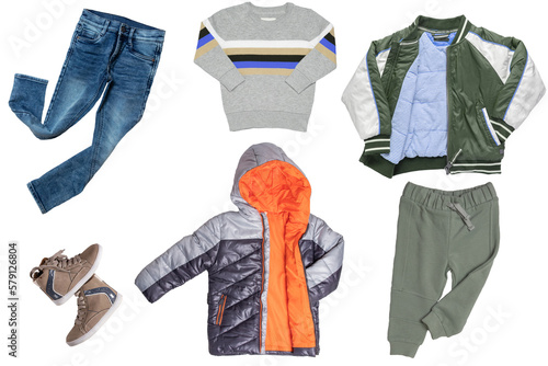 Collage set of boys spring winter clothes isolated. Male kids apparel collection. Child boy fashion clothing outfit. Colorful stylish jeans, sweater, pants, jackets, boots wearing.
