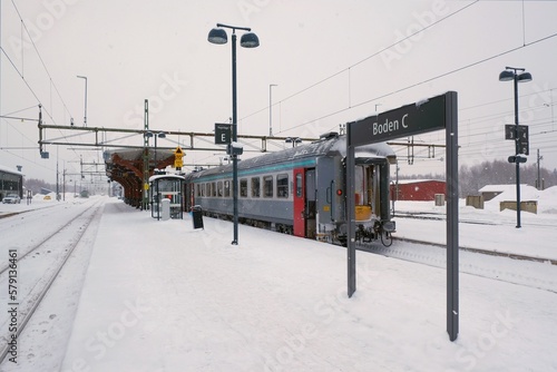 Railway station in Boden with standing train in winter scenery. Boden is town in Sweden near the Arctic Circle. Swedish Lapland