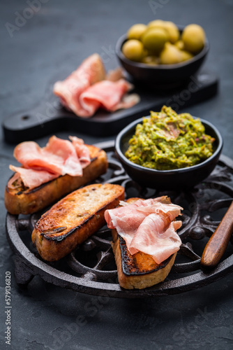 Fried bread - savory French toast with avocado spread and Serrano ham
