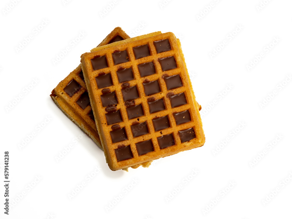 Chocolate waffles isolated on white background. Waffles in chocolate. Close-up. Chocolate waffles isolated on white background. Waffles in chocolate. Close-up.