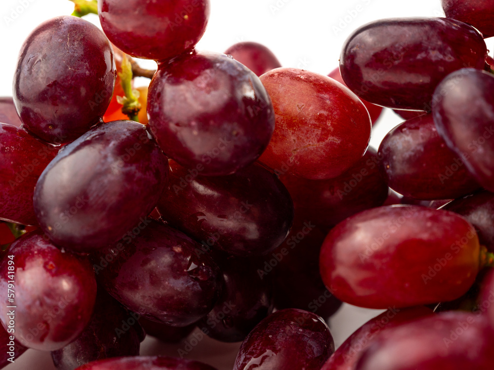 Ripe juicy grapes isolated on white background. Close-up.