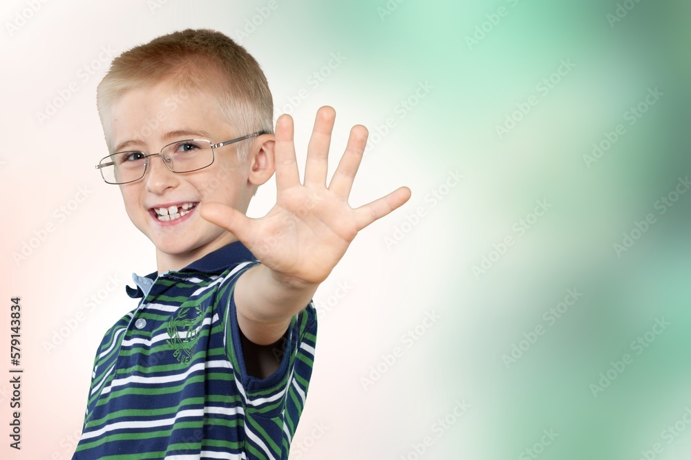 Smiling young child student posing Smiling young child student posing