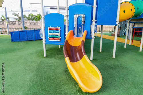 View of children's playground with slide in city