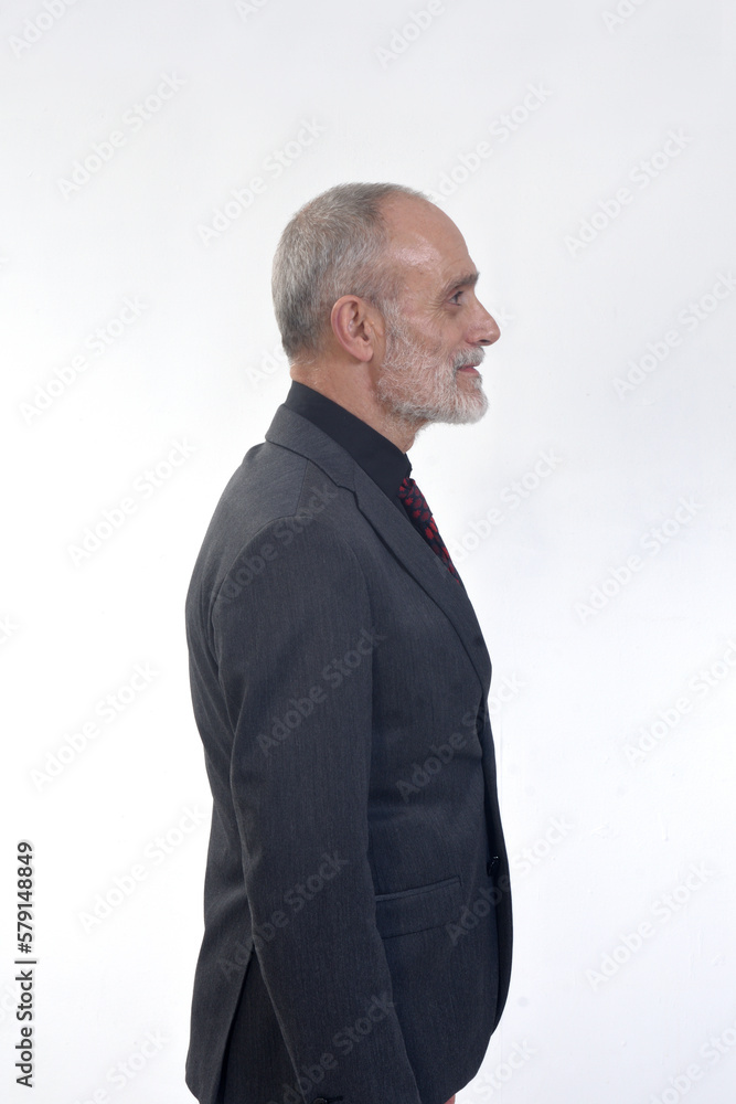 side view of a portrait of a man with suit and tie on white background side view of a portrait of a man with suit and tie on white background