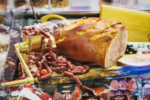 Fototapeta Naklejka Na Ścianę i Meble -  Abstract grocery showcase, assortment of sausages and farm meat products. Selective soft focus