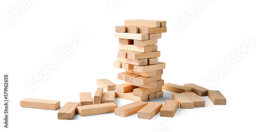 Jenga tower of wooden blocks isolated with shadow  place for text. The concept of destruction  instability.